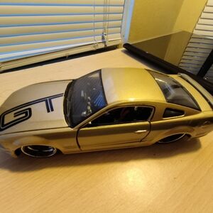 Gold Model Car with Black Accents